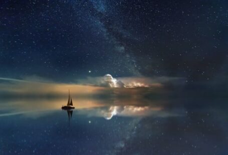Night Diving - black sailing boat digital wallpaper