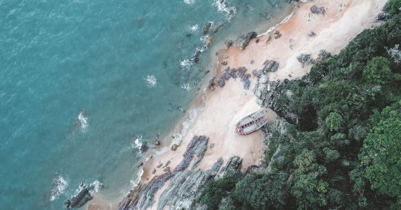 Shipwreck Discovery - Aerial Footage of a Shipwreck on a Beach