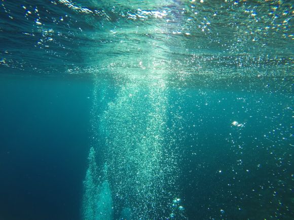 Underwater - water wave in close up photography