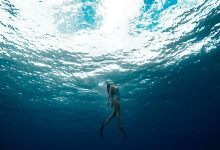 Diving - woman swimming underwater