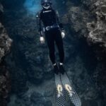 Snorkeling - Diver Swimming in the Ocean