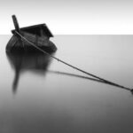 Sunken Ship - Grayscale Photography of Boat on Calm Water