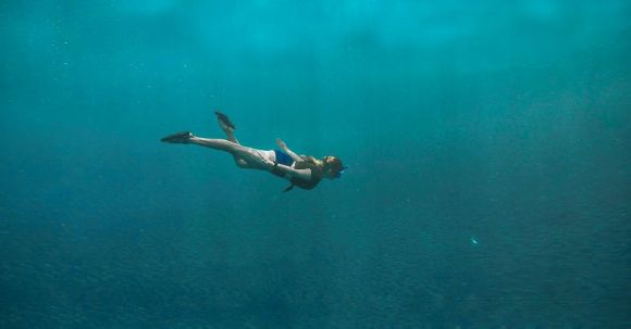 Shipwrecks For Diving - Photo of Woman Swimming Underwater
