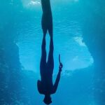 Diving Locations - A Diver Underwater Upside Down
