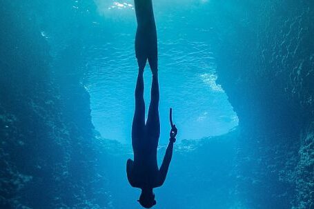 Diving Locations - A Diver Underwater Upside Down