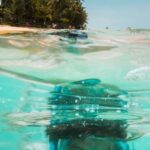 Snorkeling - Underwater Photo of a Boy Snorkeling in Blue Water