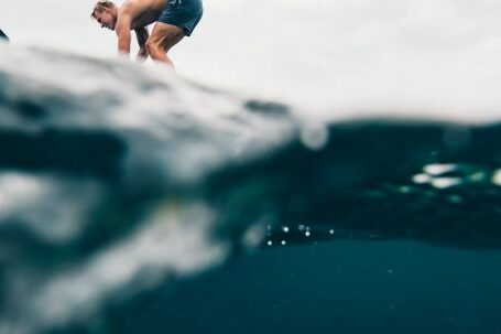 Diving Locations - Man Wearing Blue Shorts