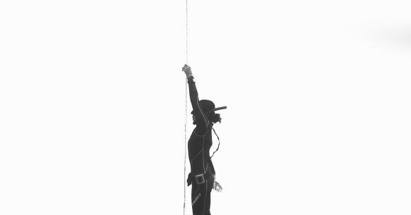 Snorkel - Diver silhouette against white background
