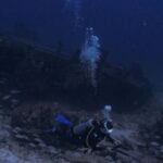 Shipwrecks For Diving - Scuba Diver Swimming near Shipwreck Underwater