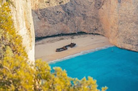 Sunken Ship - Brown Wooden Boat on Shore