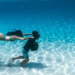 Diving Locations - Man and Woman Underwater