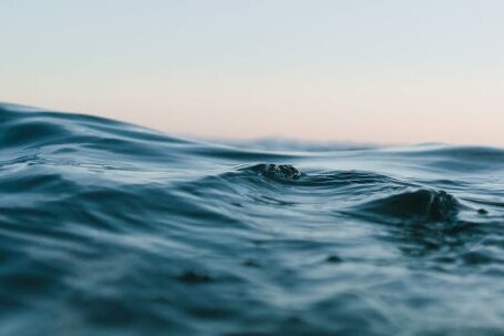 Ocean - Body of Water Under Blue and White Skies