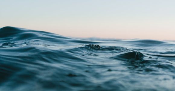 Ocean - Body of Water Under Blue and White Skies