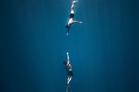 Shipwrecks For Diving - Men Diving Swimming Underwater