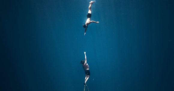 Shipwrecks For Diving - Men Diving Swimming Underwater