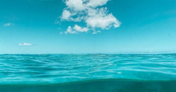 Snorkel - Blue Ocean Under Blue Sky and White Clouds