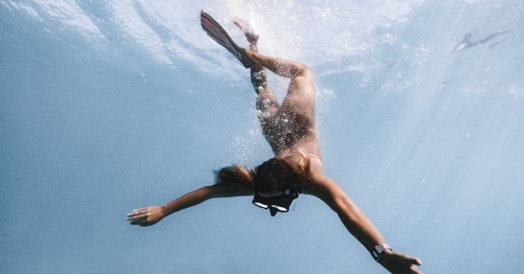 Diving Fins - Woman Diving with Fins