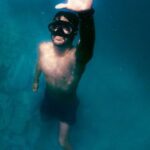 Snorkeling - A Man Wearing Diving Goggles