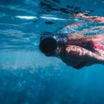 Diving Mask - Woman in Mask Swimming under Water