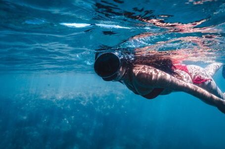 Diving Mask - Woman in Mask Swimming under Water