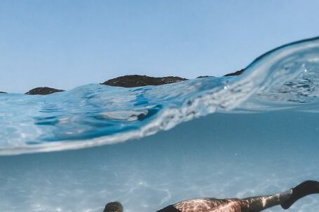 Diving Fins - A Diver Swimming Underwater