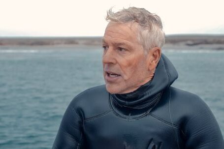 Scuba Diving - Man Wearing Scuba Diver Wetsuit