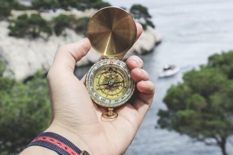 Compass - Person Holding Compass