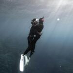 Scuba Diving - Diver in Scuba Gear Swimming Towards Surface