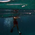 Diving - Man in Black Shorts in Water