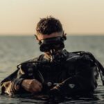Diving Mask - Scuba Diver Standing Waist Deep in the Water