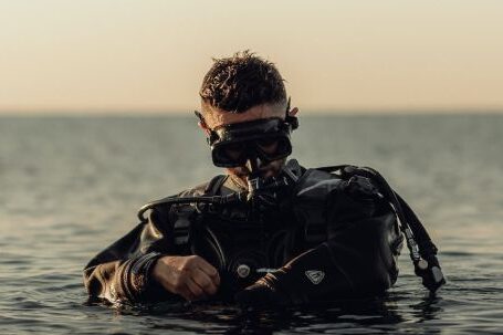 Diving Mask - Scuba Diver Standing Waist Deep in the Water