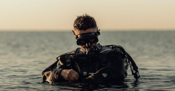 Diving Mask - Scuba Diver Standing Waist Deep in the Water