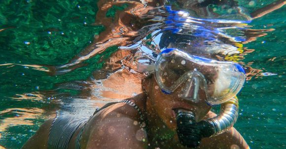 Diving Mask - Woman Wearing Goggles and Snorkel