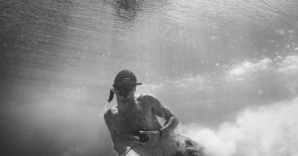 Snorkeling - A Man Holding a Camera Underwater