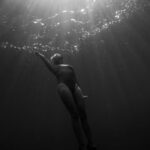 Shipwrecks For Diving - Woman Underwater Swimming Towards Surface