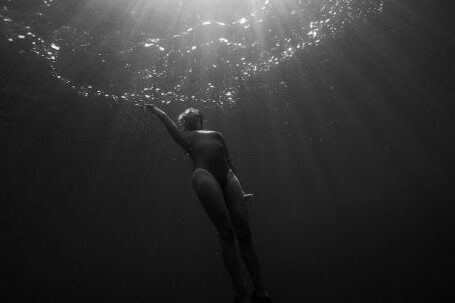 Shipwrecks For Diving - Woman Underwater Swimming Towards Surface