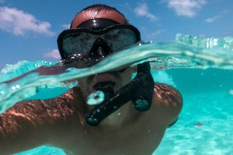 Diving Mask - A Man Snorkeling