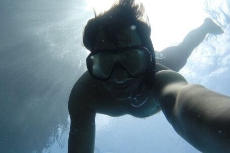 Snorkeling - Person Swimming Underwater