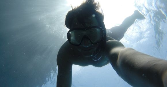 Snorkeling - Person Swimming Underwater