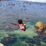 Diving - Child Diving Off Cliff Into Sea