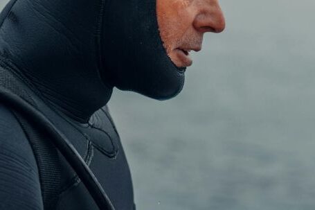 Snorkeling - Man in Black Wetsuit Wearing Black Goggles