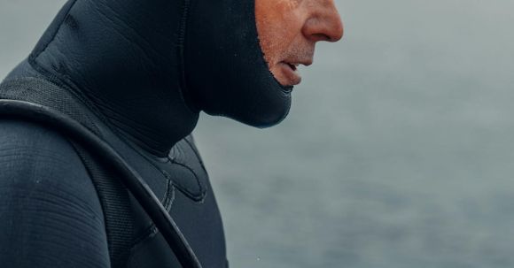 Snorkeling - Man in Black Wetsuit Wearing Black Goggles