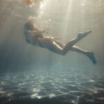 Diving Locations - Sunlight over Diving Woman