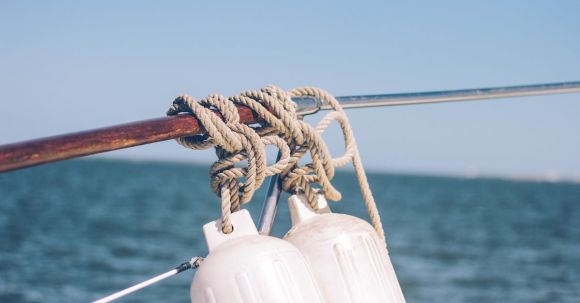 Marine - Gray Rope Tied on Brown Metal Rod