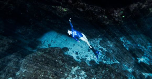 Diving Fins - Woman Diving in the Sea 