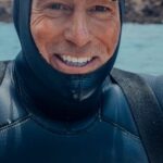 Scuba Diving - Man in Black and Blue Wetsuit and Black Goggles