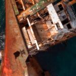 Sunken Ship - An Old Rusty Ship Floating on the Sea