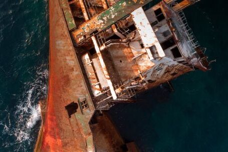 Sunken Ship - An Old Rusty Ship Floating on the Sea