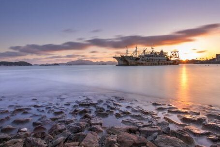 Shipwrecks - Sunset over Shore and Shipwrecks behind