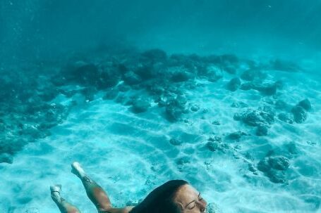 Shipwrecks For Diving - A Woman in Bikini Under Water